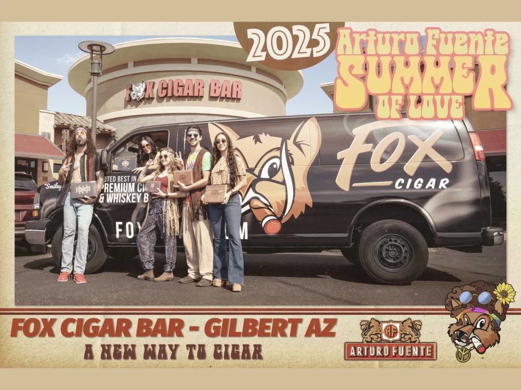 Five people in 1960s outfits pose with cigar boxes beside the Fox Cigar van in front of Fox Cigar Bar Gilbert, with 2025 event artwork