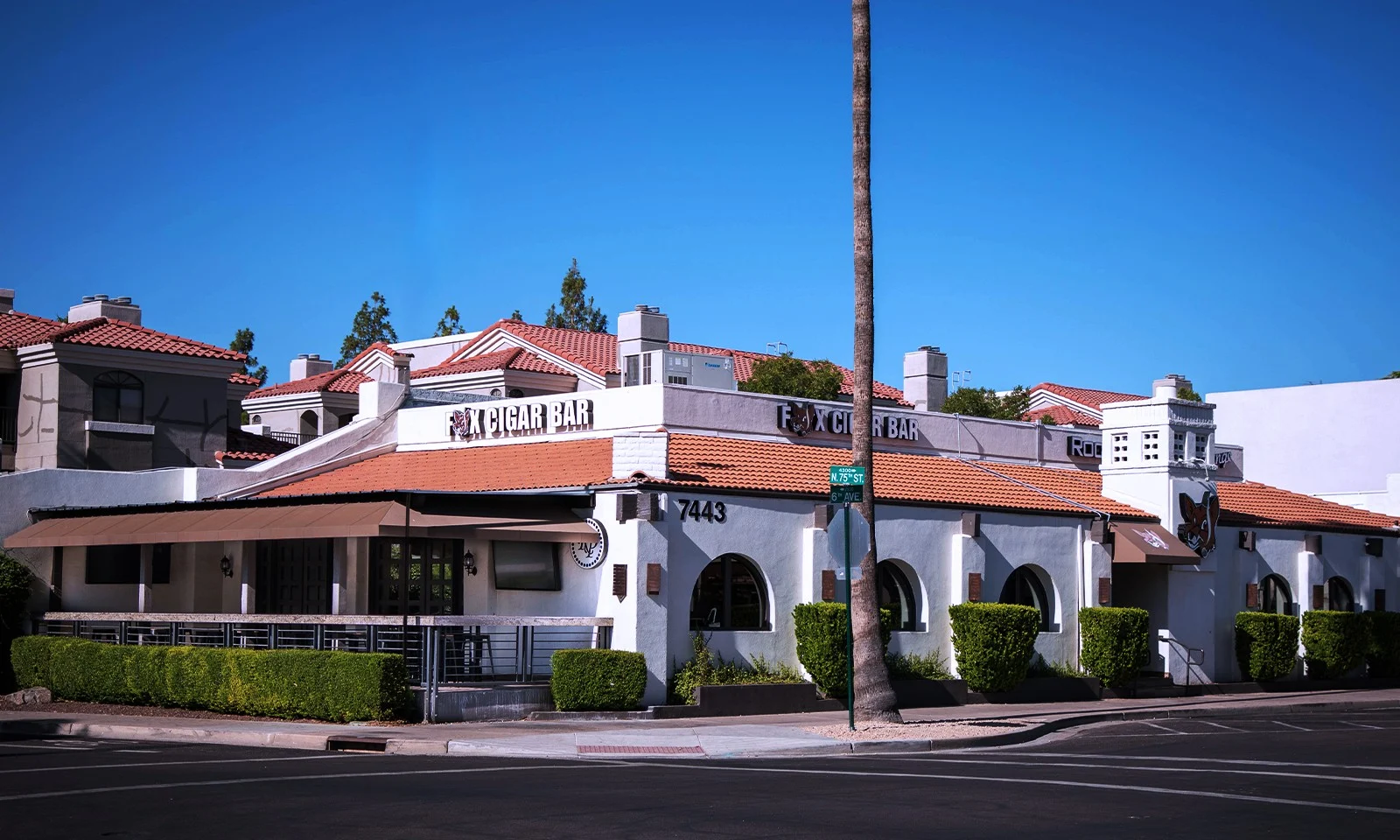 Fox Cigar Bar Scottsdale at 7443 E 6th Ave, white stucco building with a red tile roof
