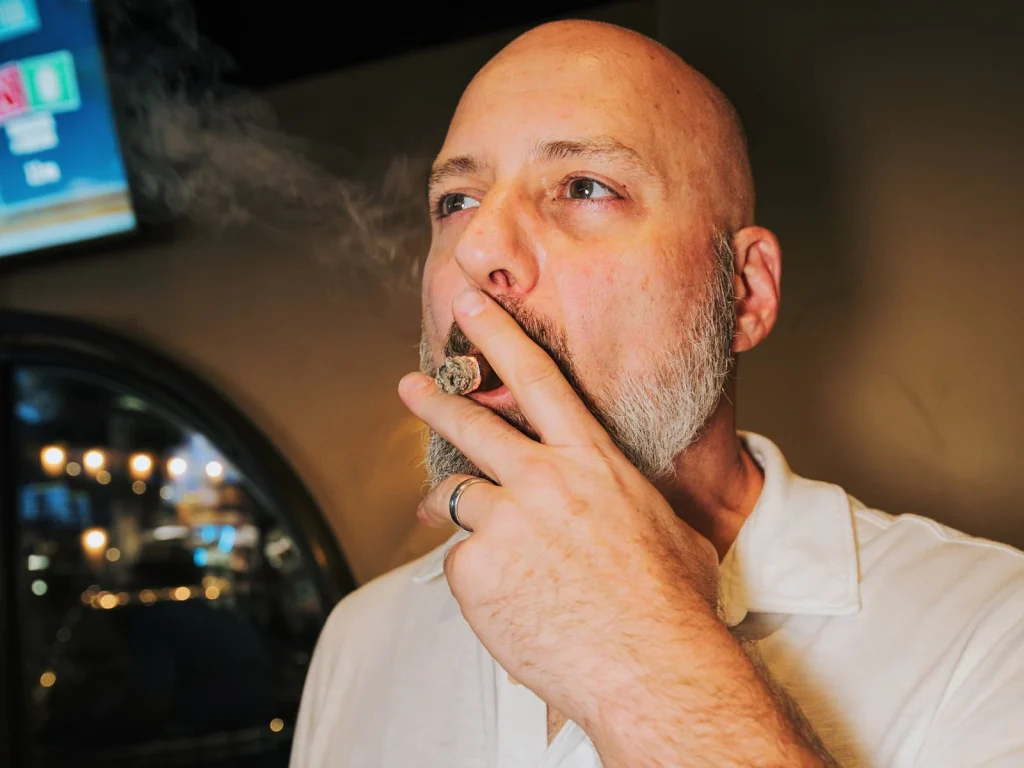 Ryan savors a Rare Pink from the Fuente line with pure satisfaction and bliss.