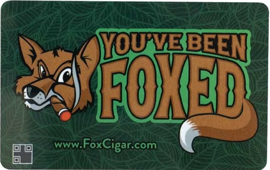Fox Cigar gift card: the Fox mascot beside the words You have Been Foxed on dark green